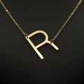 Elegant gold stainless steel necklace featuring a minimalist capital letter R pendant - Gold R