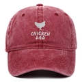 Detail of white chicken silhouette and Chicken Dad embroidery on red washed cotton cap - One Size / Burgundy
