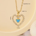 Golden heart necklace with blue zircon inlay and measurement details 16.6mm pendant - Blue