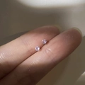 Delicate S999 silver stud earrings featuring small pink cubic zirconia in four-prong setting - Light Pink