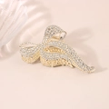 Pince à cheveux noeud doré élégante avec strass brillants sur fond beige clair - Pince Nœud Plein Strass 11CM-Or