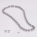Detail of 60cm silver bead chain necklace with 10mm stainless steel beads and 60g weight - Necklace / 10mm / Steel