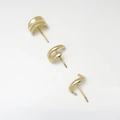 Macro view of gold alloy earrings set featuring vintage beads and minimalist spiral designs - 3-Piece Stud Earring Set / Gold