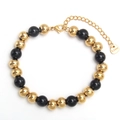 Polished black and gold stainless steel beaded bracelet with lobster clasp and extension - 8mm / Black & Gold