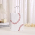 Detailed view of white baseball gift paper bag with red stitching in a cozy lifestyle setting - Red and Black Stitching Vertical Style