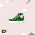 Cute green high-top canvas sneaker enamel pin with yellow laces for clothing decor - Shoe