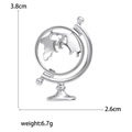 Detail view of silver globe brooch with size 3.8x2.6cm and weight 6.7g on white background - Silver