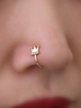 Macro shot of gold-plated crown nose clip featuring three inlaid white zircons on nose wing - Gold Crown Style (SE1444)