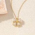 Elegant gold butterfly necklace featuring white faux pearls and sparkling crystals - BXL0256-22 Gold Pearl Bowknot
