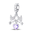 Close-up of bird charm pendant with purple heart crystal and heart-engraved bail - Peace Pendant (PAC1341)