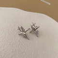 Modern silver four-point star earrings with square crystals and sleek metal finish - Four-Pointed Star Studs / Silver