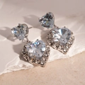 Elegant silver heart-shaped earrings with large central crystal and sparkling rhinestones - Style 15 Necklace - Silver