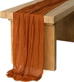 Terracotta cheesecloth table runner with rustic wrinkled texture on wooden table - 90*180cm / Orange Red