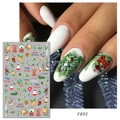 Detail showing F892 Christmas nail stickers with Santa Claus and reindeer on nails - F892 (Bare Sheet)