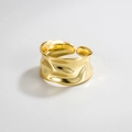 Macro detail of wide gold irregular textured ring featuring hammered metal surface design - Adjustable Open / Gold