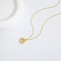 Gold life tree pendant necklace with white crystals on a minimalist white background - Tree of Life / Gold