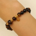 Tiger eye stone beaded bracelet with golden Fu character square charm on wrist - Tiger Eye Bracelet with 'Fu' Pendant Style (DZ-685)