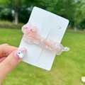 Pink cat acetate hair clip with marble texture, rhinestone eyes, and pearl collar detail - Sakura Pink Cat