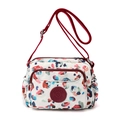 Waterproof nylon crossbody bag with colorful floral print and adjustable red strap - Abstract Print