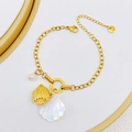 Bracciale oceano in acciaio inossidabile dorato con perla, pesce e pendente in madreperla - Stile Pesce di Mare