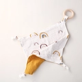 Detail of baby organic cotton rainbow muslin comforter with natural wooden teething ring - Rainbow Patchwork