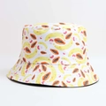 White bucket hat featuring vintage tropical fruit prints with banana and papaya patterns - One Size / White