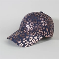 Detail of blue denim baseball cap featuring rose gold leopard print with metallic finish - Style 11-Dark Blue Rose Gold Leopard Print