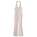 Mouwloze beige jumpsuit met halternek, open rug, diepe V-hals en uitlopende broekspijp - S / Wit
