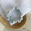 Elegant light blue satin scrunchie with silky finish for ponytail styling and hair decor - Light Blue