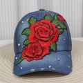 Detail of blue denim baseball cap featuring red rose embroidery and silver rhinestones - Style 2-Blue Denim Rose Rhinestone