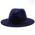 Detail of the navy wool fedora showing the brown woven leather band and metal emblem - M (56-58cm) / Navy Blue
