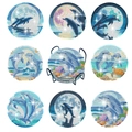 Set of 8 ocean-themed DIY diamond painting coasters with a black metal holder - Dolphin Ocean Series Style