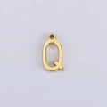 Macro shot of a polished gold letter Q charm pendant for DIY necklace jewelry making - Q (Bracelet Accessory) / Gold