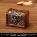 Vintage red wooden jewelry box with embossed floral pattern and bronze metal clasp - Narcissus