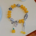 Vintage yellow agate bracelet with silver Fu character pendants and lucky charms - Flat: Elephant Brand Peace Fish Tassel Bracelet