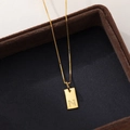 Minimalist gold S925 silver necklace featuring a square pendant engraved with letter N - Letter N / Gold