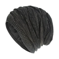 Close-up of thick gray faux fur lining inside a heavy-knit winter beanie hat - Diamond-patterned Fleece-lined Beanie - Black And Gray / One Size