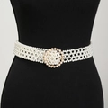 Detailed view of women's woven pearl belt with circular gold-rimmed buckle on a mannequin - Seven-row Pearl Round Buckle Belt Gold