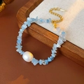 Detail of blue aquamarine chips and white pearl bracelet with adjustable gold clasp - Aquamarine Pearl Bracelet / Blue/White