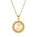 Detailed macro view of a gold-plated necklace featuring a round zircon Z-letter pendant - Letter Z