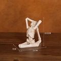 Figura de esqueleto de resina en postura de yoga con acabado marfil para decoración de mesa - Calavera Estiramiento