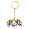 Detail of sunflower locket keychain showing engraved You are my sunshine quote inside - T00010 Gold Sunflower Silver Disc (You are my sunshine)