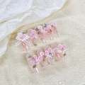 Detailed handmade 3D rose press-on nails with pink glitter and white ribbon decor - Extra Small (XS) / Pink Gradient Long Coffin Style