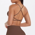 Close-up of chocolate brown sports bra with thin cross back straps and matte texture - S / Chestnut Brown