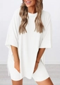 Close-up of white oversized short sleeve top and matching cycling shorts with fine texture - White
