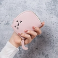 Cute pink cat-shaped card holder in lychee grain PU leather held by a hand - Pink