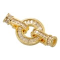 Macro shot of gold-plated circular clasp with micro-pave cubic zirconia and unique interlocking - VK200 Gold
