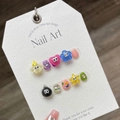 Handmade 3D cartoon press-on nails with colorful eye designs and glitter on a white card - Extra Small (XS)