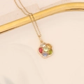 Dettaglio di un ciondolo a fiore dorato con gemme colorate su un vassoio elegante - 3# Fiore Piccolo