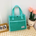 Bright green mesh tote bag with dual handles and fashion label for beach and travel - Green